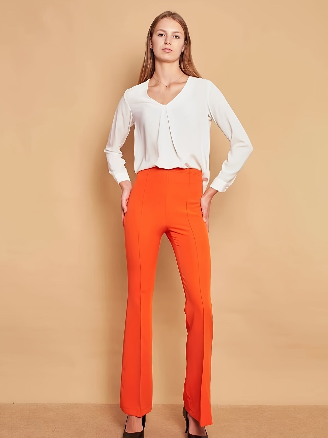 Lara - Oranje flare broek met hoge taille