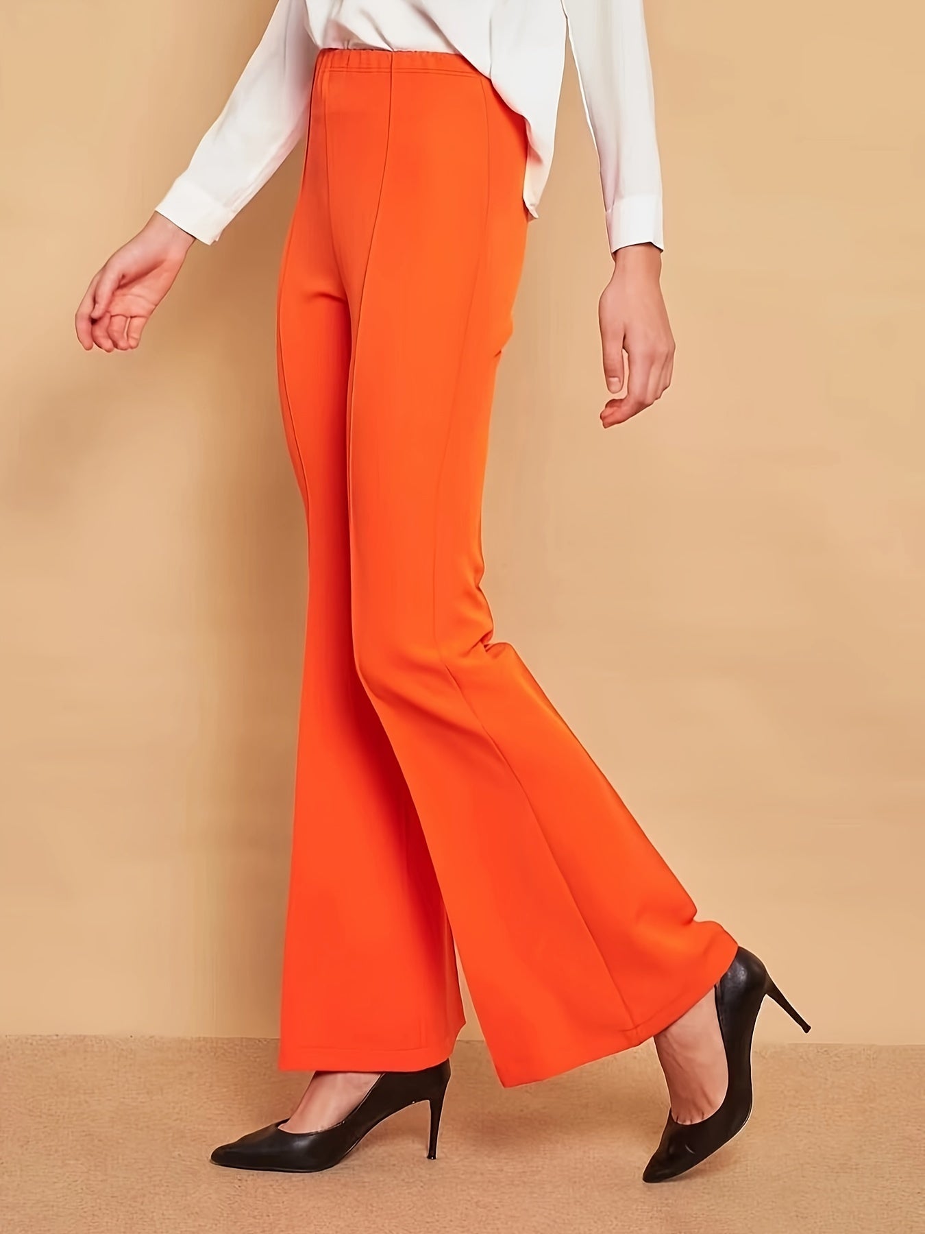 Lara - Oranje flare broek met hoge taille