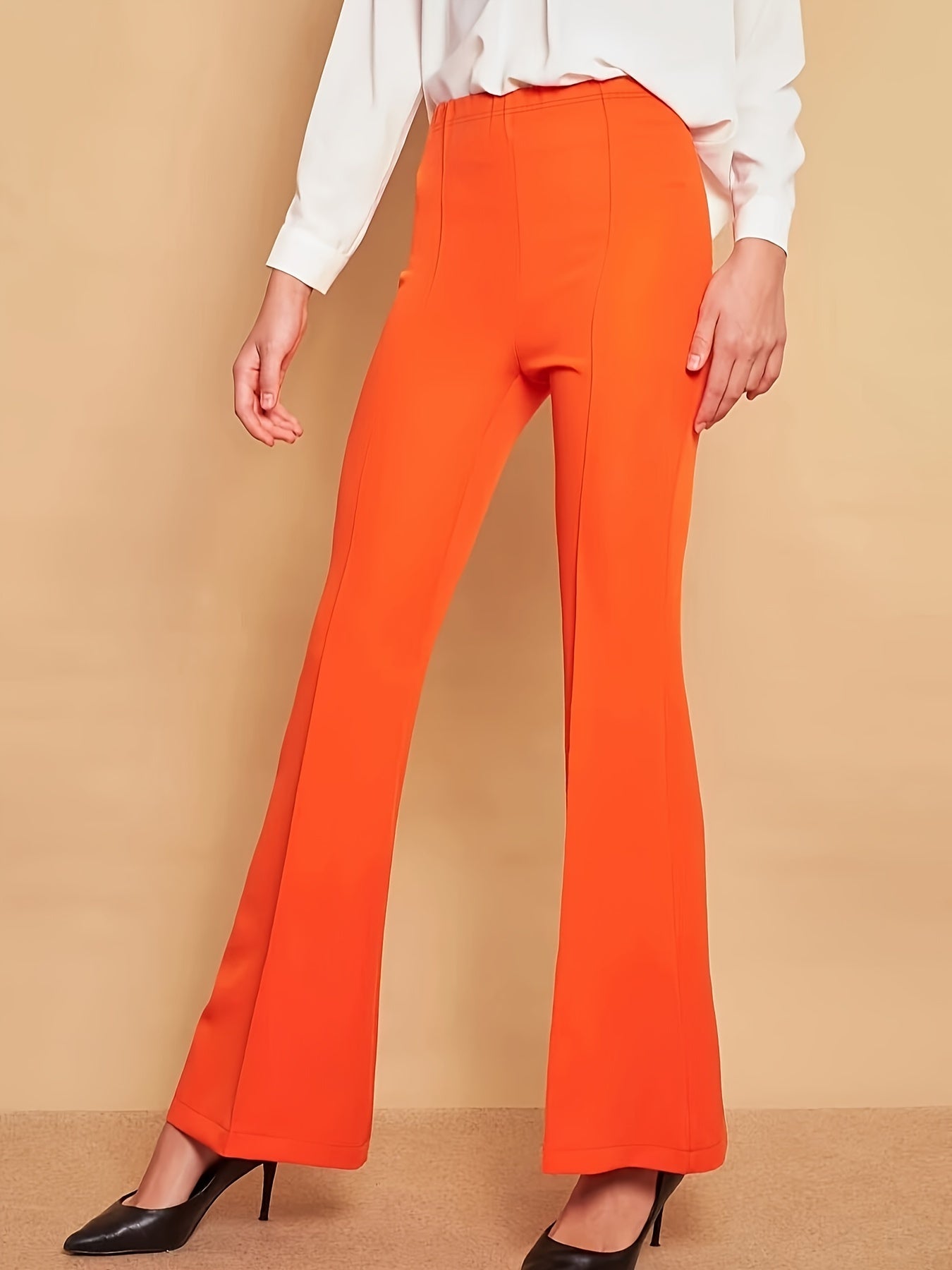 Lara - Oranje flare broek met hoge taille