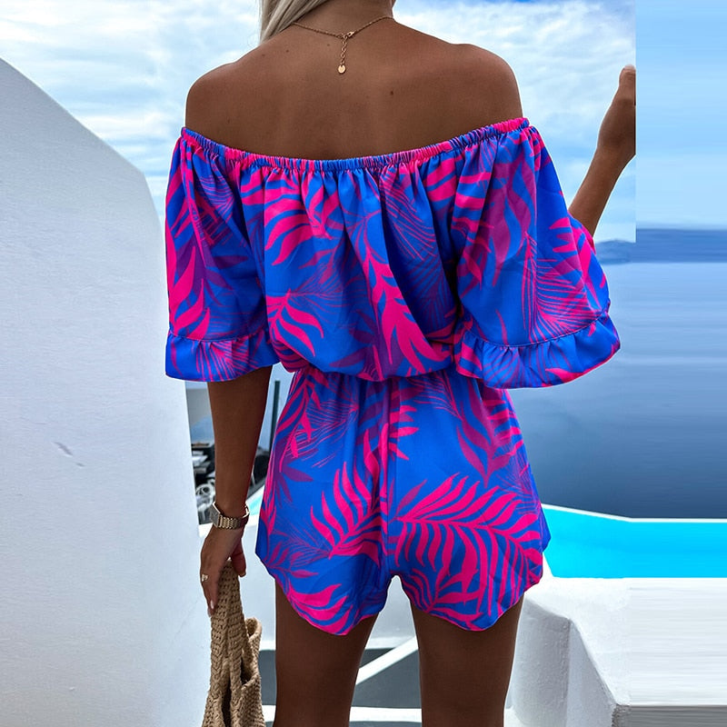 Linda - Blauw/roze off-shoulder playsuit